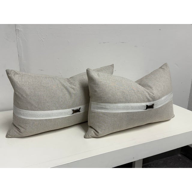 Design Plus Gallery presents a pair of Frost Buckle Lumbar Pillows from the Thom Filicia Home Collection. The rectangular...