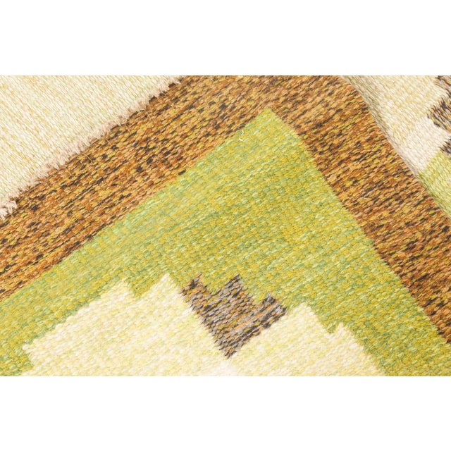 Vintage Swedish Green, Brown Flat-Weave Wool Rug Signed by Ingegerd Silow Size: 6'4" × 9'2" (193 × 279 cm) A charming...