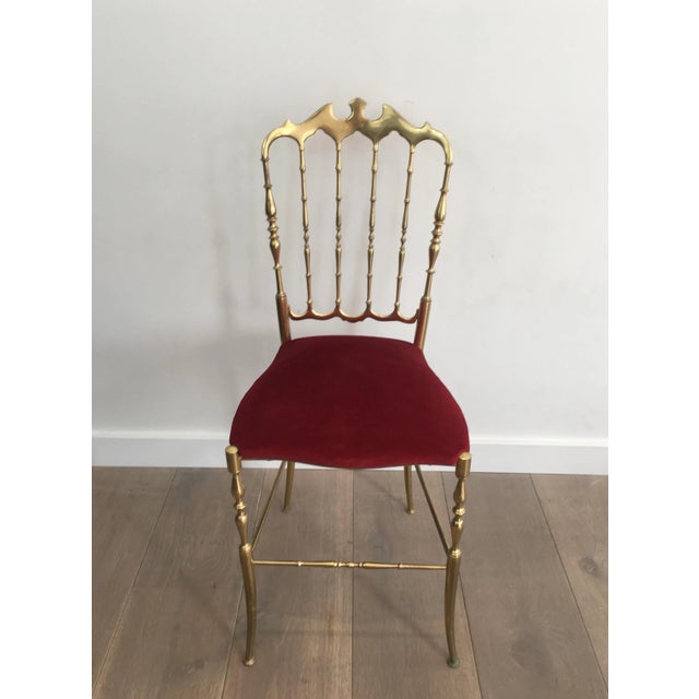This Chiavari chair is all made of brass with a red velvet on the seat. The quality of this chair is a very nice. This is...