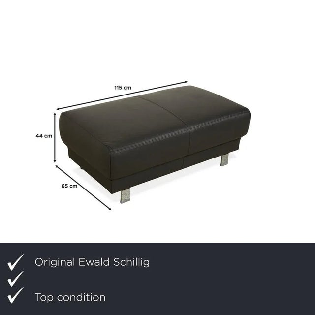 This elegant Ewald Schillig stool combines style and comfort. with its high-quality upholstery in a sophisticated grayish...