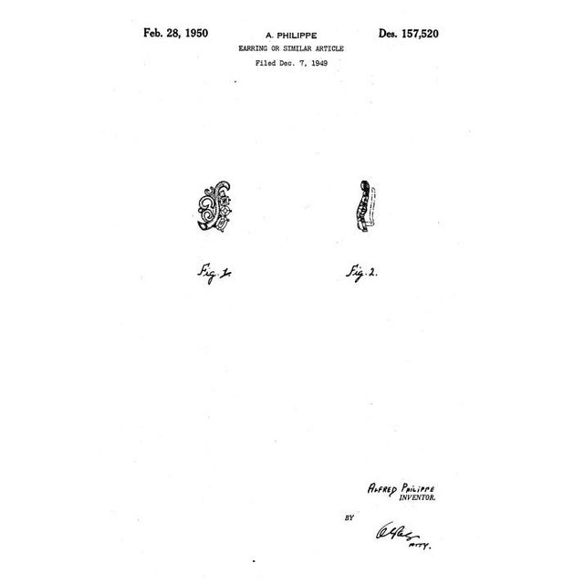 This is part of Chairish’s Costume Jewelry assortment. Rhodium plated stylized leaf with oval, square and round faux-...