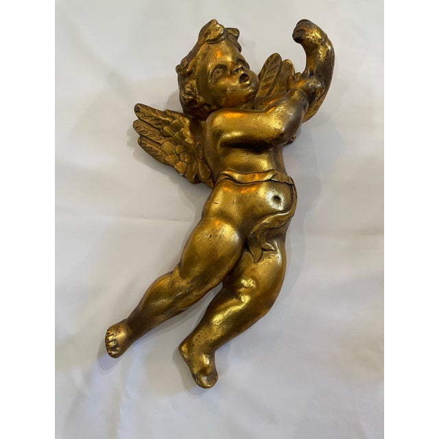 Pair of large angel’s gold leaf on ceramic composition made in France early 20 century.