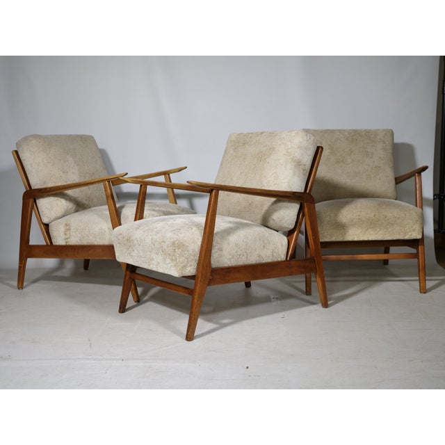 Scandinavian teak lounge chairs, set of 3, 1960s. Delicate armrests, solid teak frames, loose back cushions, and...