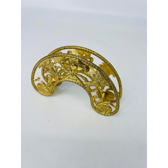 Elegant, ornate, brass napkin holder, depicts Chinese juniper. Imported from Italy.