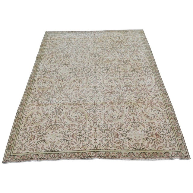 Hand-knotted with care using traditional rug-making techniques, this wool rug blends timeless craftsmanship with a modern...