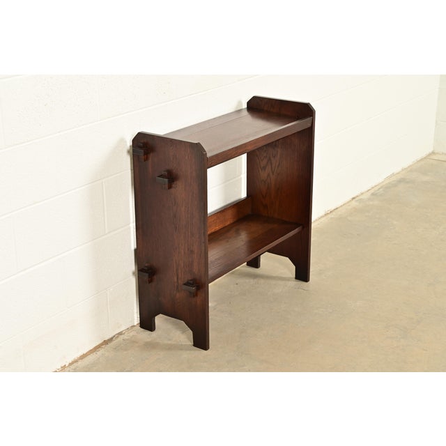 A gorgeous antique Mission or Arts & Crafts period quarter sawn oak bookcase, book trough, or magazine stand In the manner...