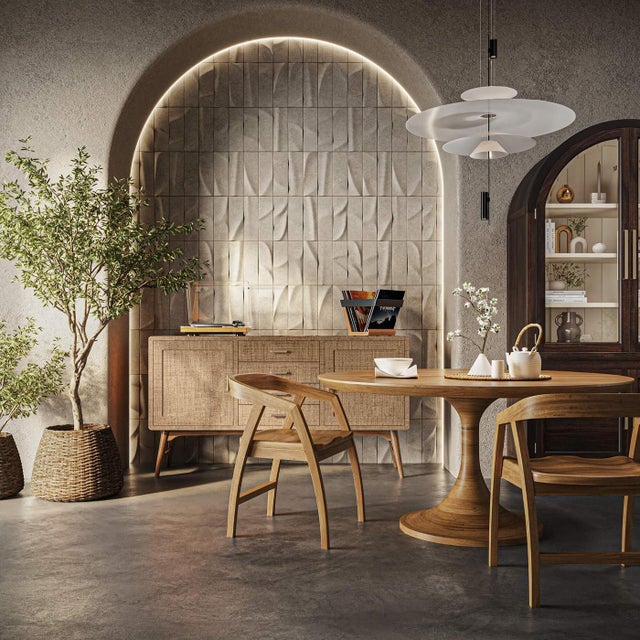 Handcrafted from mahogany and finished in Antique French Oak, this round pedestal table pays homage to the timeless tulip...