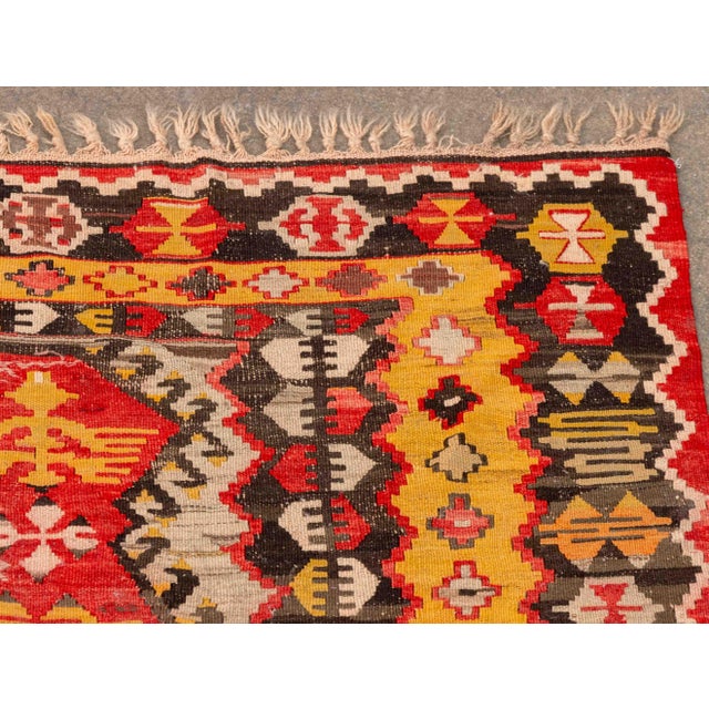 Turkish Kilim Flatweave Wool Rug, with red and orange geometric motif. 6' L x 3' 5" W. Provenance: From a 45 East 62nd...