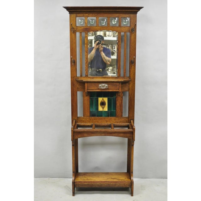 Antique English Art Nouveau Oak Wood & Green Tile Coat Rack Umbrella Stand Hall Tree. Item features a central beveled...