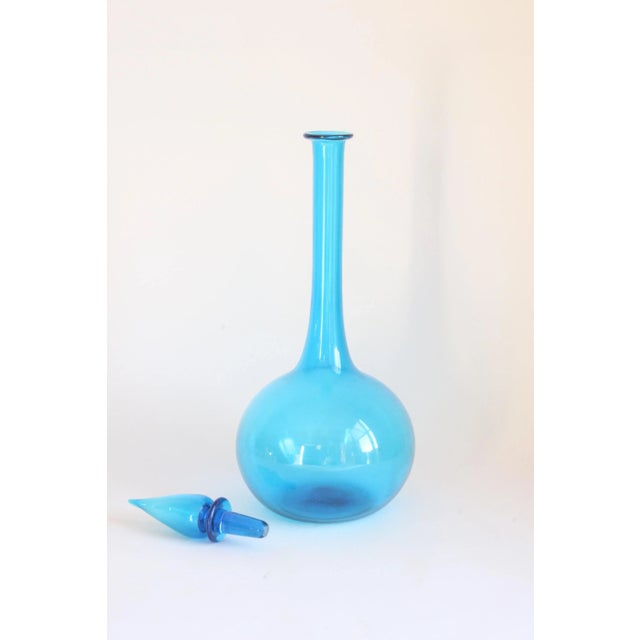 A blue "genie" bottle with stopper in handblown glass from Empoli, Tuscany 1960s.
