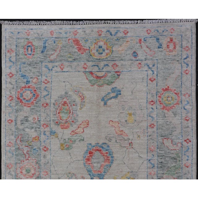 2020s Modern All-Over Floral Oushak With Muted Background and Accent Colors For Sale - Image 5 of 13