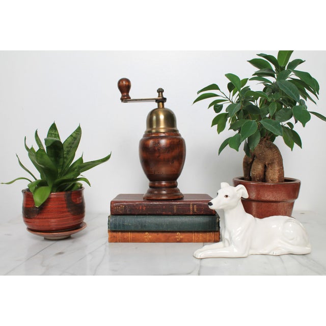 Vintage wood and brass pepper mill by Ethan Allen. Made in Italy. Light age wear. Makers mark on bottom.