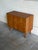 Beautiful vintage Danish modern cabinet crafted in warm teak with clean Scandinavian lines and elegant tapered legs. This...