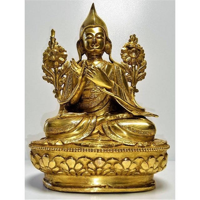 Beautiful Buddha sculpture from the Tibet, a completely fiery bronze figure of a llama on a high Lotus socket with...