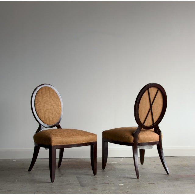 A pair of Barbara Barry Oval X-Back side chairs for Baker Furniture, with the designer's signature crossed-bar motif set...