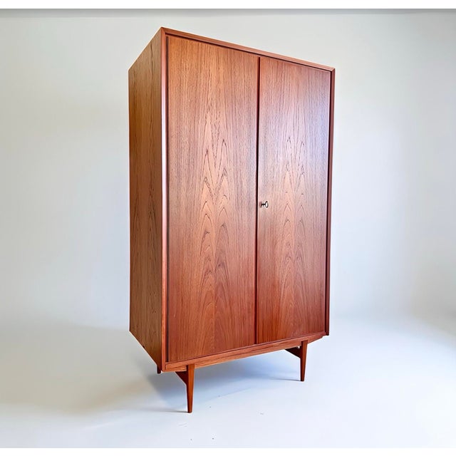 We are offering a rare, beautifully designed mid-century wardrobe/cloakroom cabinet from the 1960s – likely from Germany....
