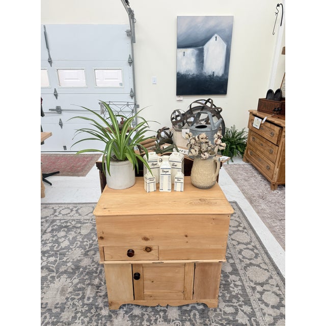 As a nightstand, this sugar chest doesn’t just hold your bedside essentials—it anchors the room with history. Its scrubbed...
