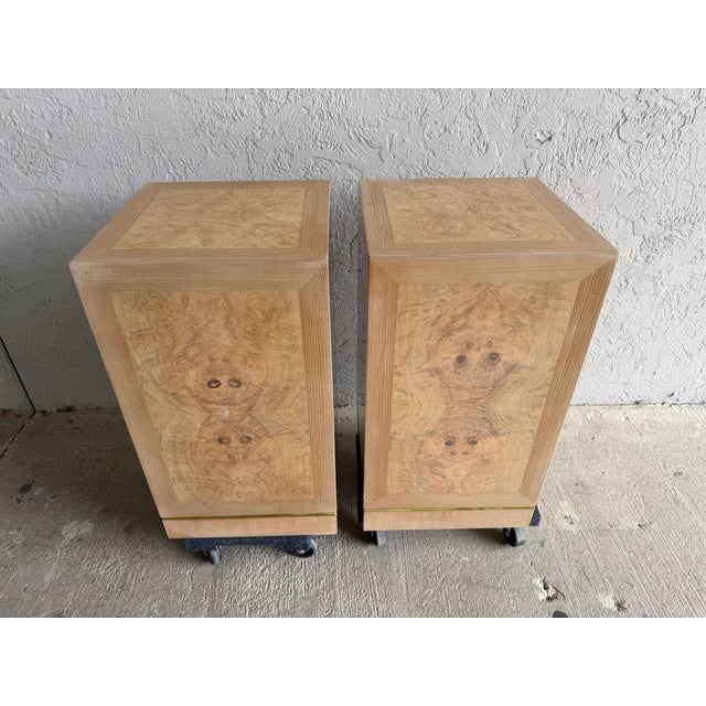 Beautiful vintage pair of Drexel Heritage burlwood dining table pedestals featuring dramatic book-matched burl veneer on...