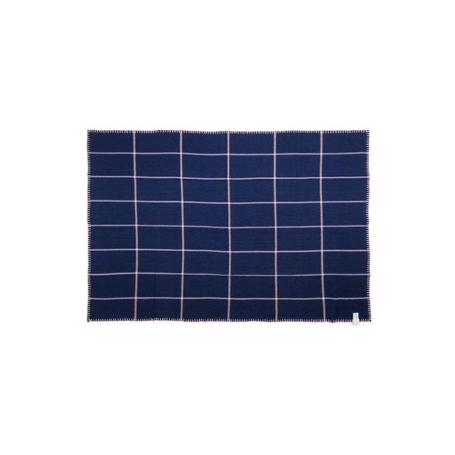 Blue plaid manta by Sebastian Herkner Materials: 100% natural virgin wool. Technique: hand-woven in Colombia. Dimensions:...