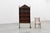 Evoking the rustic poetry of early rural craftsmanship, this solid chestnut shelving cabinet from France, circa 17th...