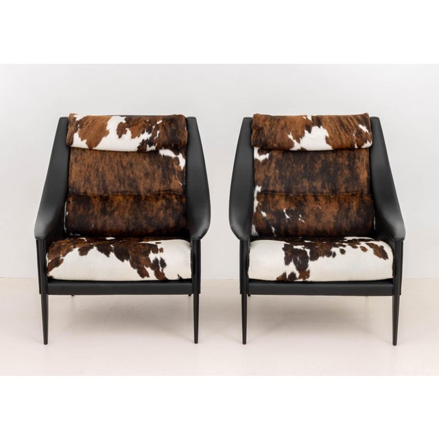 Pair of Gio Ponti for Poltrona Frau "Dezza" Lounge Chairs, with cowhide and black leather upholstery on chrome-plated...