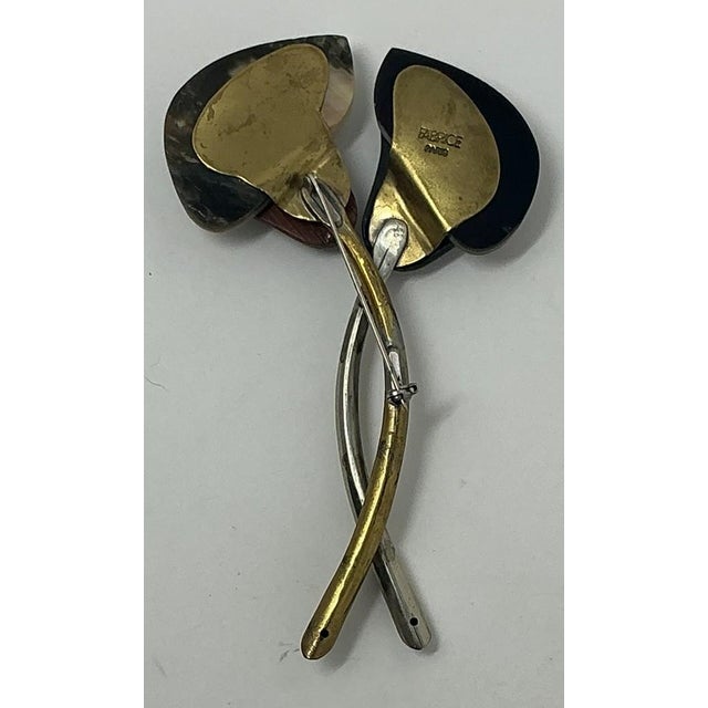 Fabrice Paris Floral Style Brooch Two entwined stems, one silver-toned and one yellow-toned. The silver-tone stem has an...