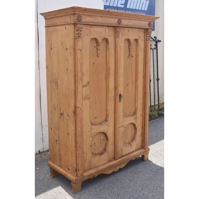 Built from heavier stock than most, and with a beautiful color and lots of character, this sturdy little two door armoire...