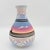 A beautifully graphic signed Navajo pottery vase, painted in the atmospheric colors of a Southwestern sunset. Soft layers...