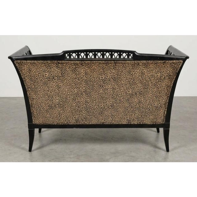 The item pictured is actually a two-seat settee or bench rather than a single side chair, but it is heavily inspired by...
