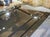A French 1970s Wrought Iron and Brass Dining Table With Smoked Glass Top For Sale - Image 12 of 18