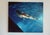 Large-scale contemporary swimmer painting by California artist Benjamin Anderson. This striking 48” x 60” work captures a...