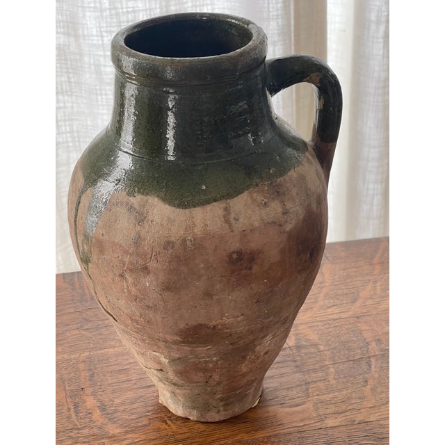 Originally used to store oils, this iconic vintage Drip Vase acts as a stand alone piece or vessel for dried branches or...