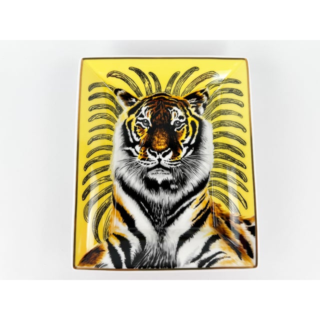 Hand-painted Hermès porcelain vide-poche featuring the iconic Tigre Royal design by Christiane Vauzelles. Made in France,...