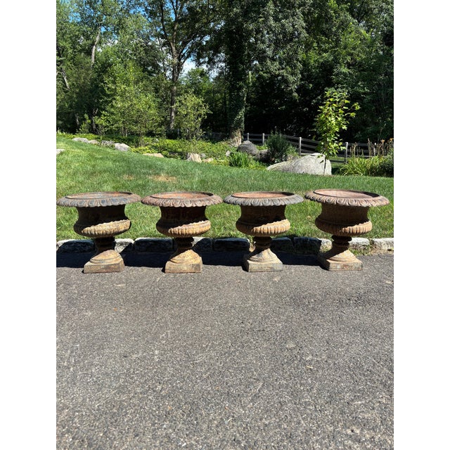 Beautiful antique garden urns make stunning focal points in any outdoor space. Each cast iron urn is hand-crafted,...