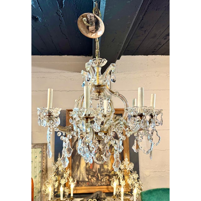 This is a stunning example of an Italian Maria Teresa chandelier that features mouth blown supports secured with the...