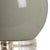 Provide accent lighting with this modern bottle style table lamp. A soothing sage green glazed ceramic with silver leaf...