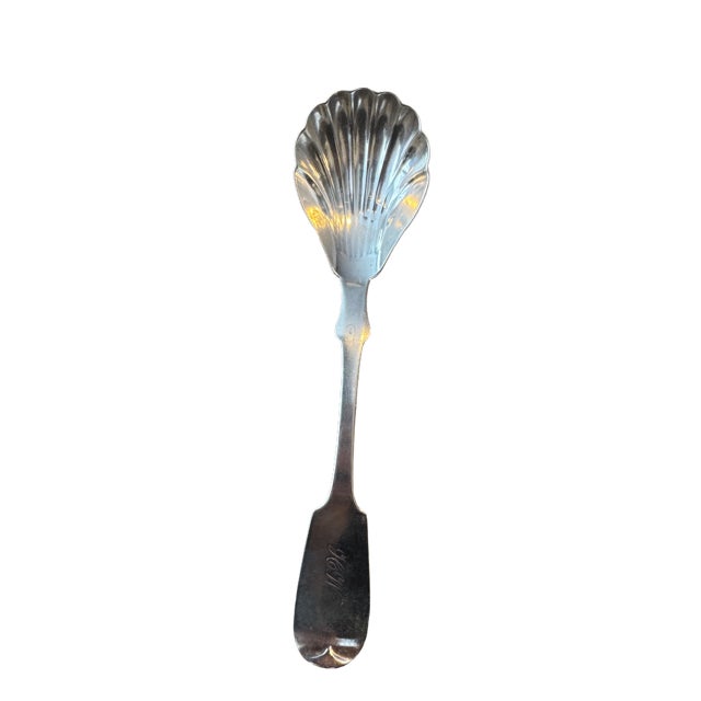 Antique Coin Silver Shell Sugar Spoon with "HW" Monogram on front handle of Spoon. 6.375" high, 1.5" wide. Good Estate...