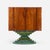 Phillip Lloyd Powell Rotating Walnut Case / Bar, 1965 Walnut, Carved and painted wood base, cane, felt interior...