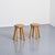 This pair of stools was designed by René Martin in the 1960s. The pine frame consists of four round legs supporting a...