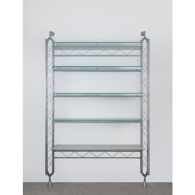 Large Post-modern Abracadabra shelf unit, Laquered Aluminum construction with u-shaped glass shelves. Designed by Italian...