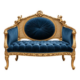 French-Style Bottle Green Velvet Settee – Tufted Upholstery, Cane Back & Ornate Gold Leaf Frame For Sale