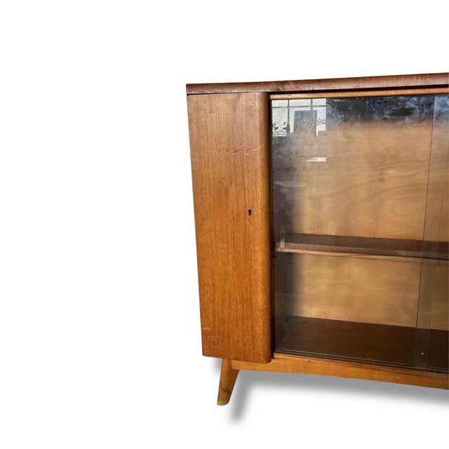 Mid-Century Drinks Cabinet in Teak with Glass Sliding Doors and Adjustable Shelf For Sale - Image 4 of 11
