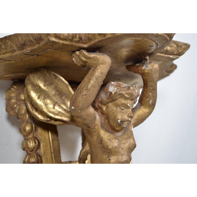 Wood France XVIIIth Century Small Wall Bracket in Stuccoed and Gilded Wood, the Scalloped Top Supported by Zéphir For Sale - Image 7 of 13
