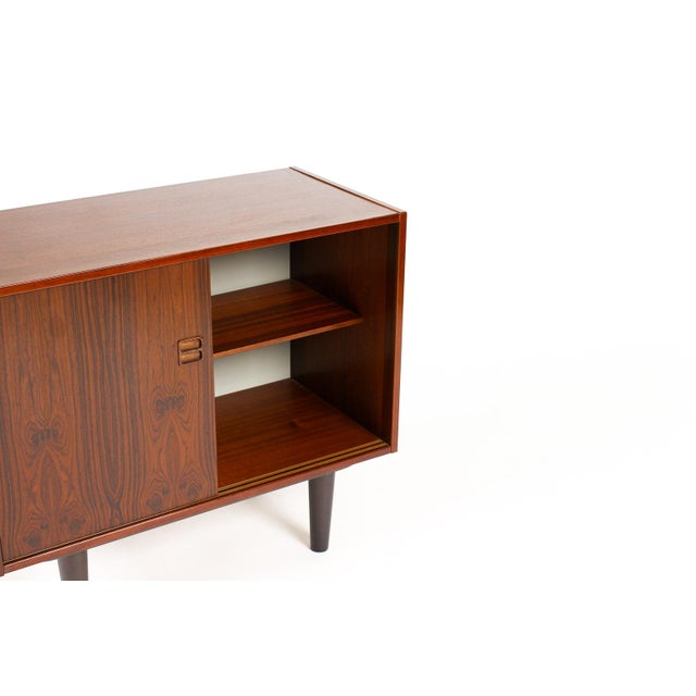 1960s Danish Modern Mid Century Compact Rosewood Credenza Sideboard — Sliding Doors For Sale In Los Angeles - Image 6 of 7