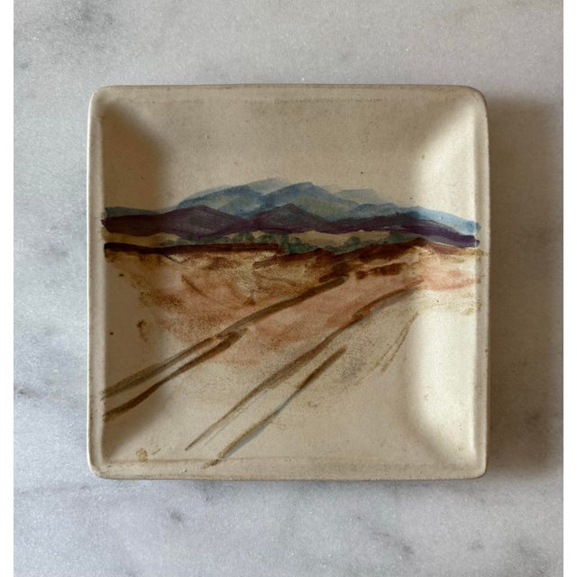 Vintage ceramic square plate of a mountain scene hand made and hand painted by Santa Fe artist Luisa Baldinger.