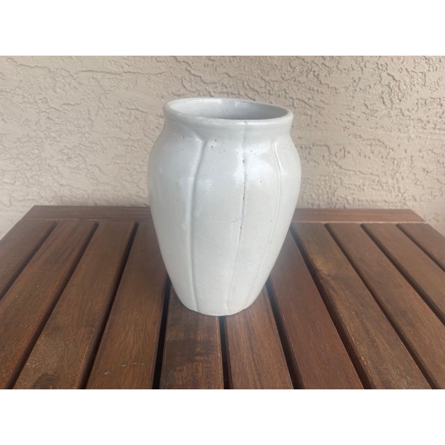 Here is a beautiful Zaneville or Roseville unmarked off-white art pottery vase with an impressed number on the bottom of...