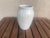 Here is a beautiful Zaneville or Roseville unmarked off-white art pottery vase with an impressed number on the bottom of...