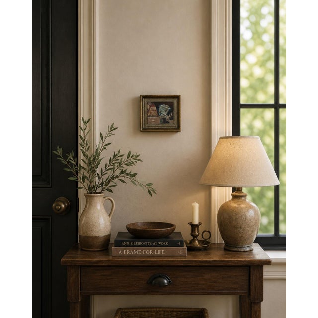 Evocative vintage still life painting signed “Aviles” and dated 1962, depicting an unconventional arrangement of well-used...