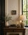 Evocative vintage still life painting signed “Aviles” and dated 1962, depicting an unconventional arrangement of well-used...