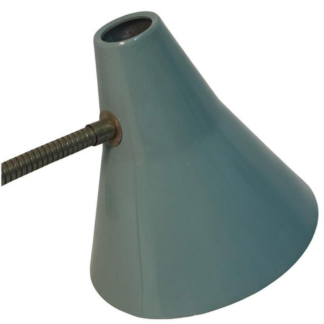 Vintage desk lamp that optionally can be used as a wall mounted lamp / sconce due two the two indentations on the bottom...